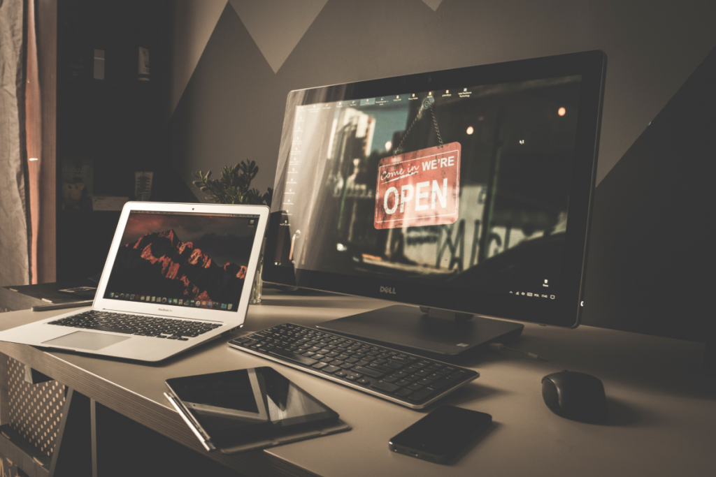 stock photo looking at a laptop screen and monitor